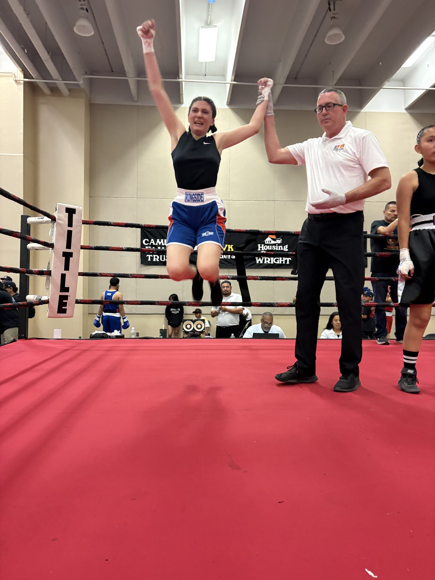 Old School Boxing Club amateur fighter celebrating a win