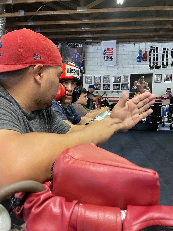 Coach working with an Old School Boxing Club amateur fighter