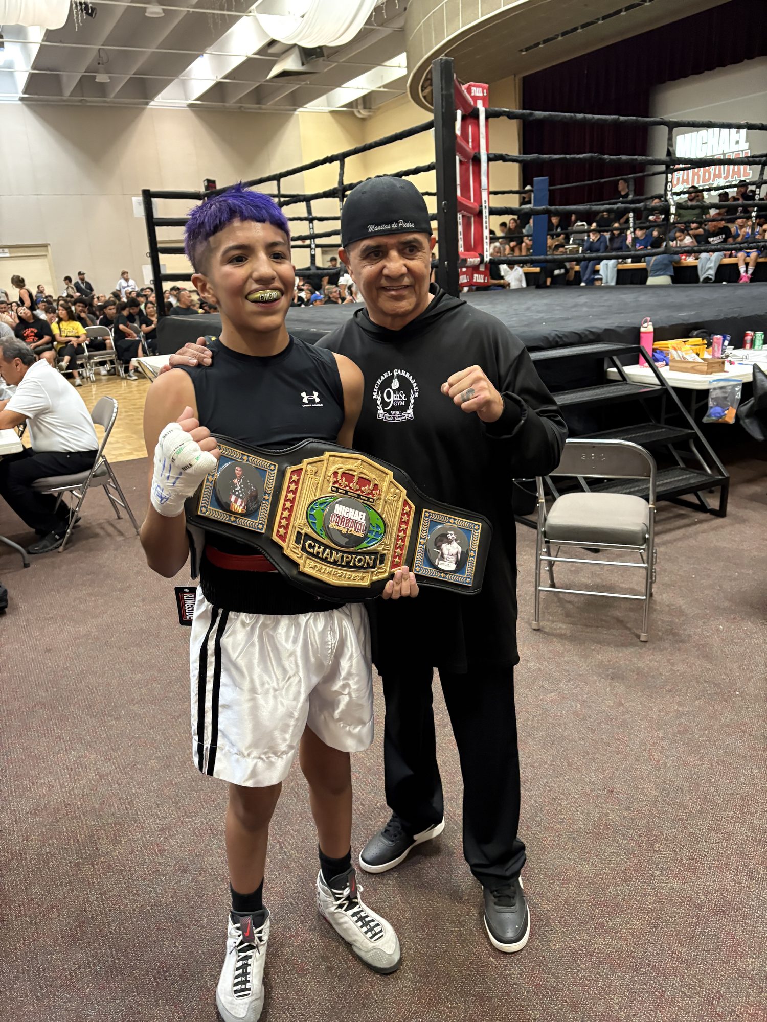 Old School Boxing Club amateur fighter with boxing legend Michael Carbajal