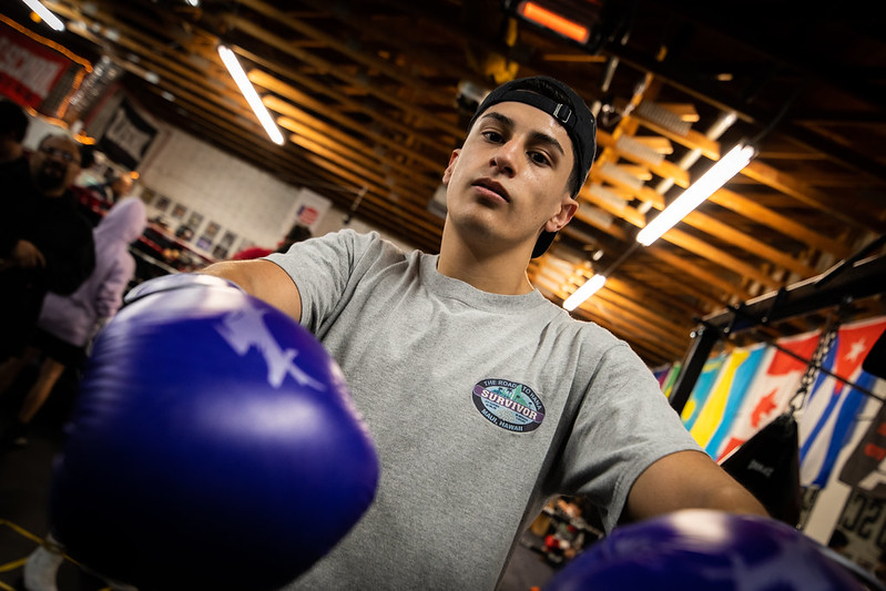GCU boxer wearing purple gloves during training