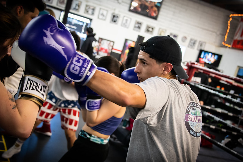 GCU boxer throwing a punch during partner drills