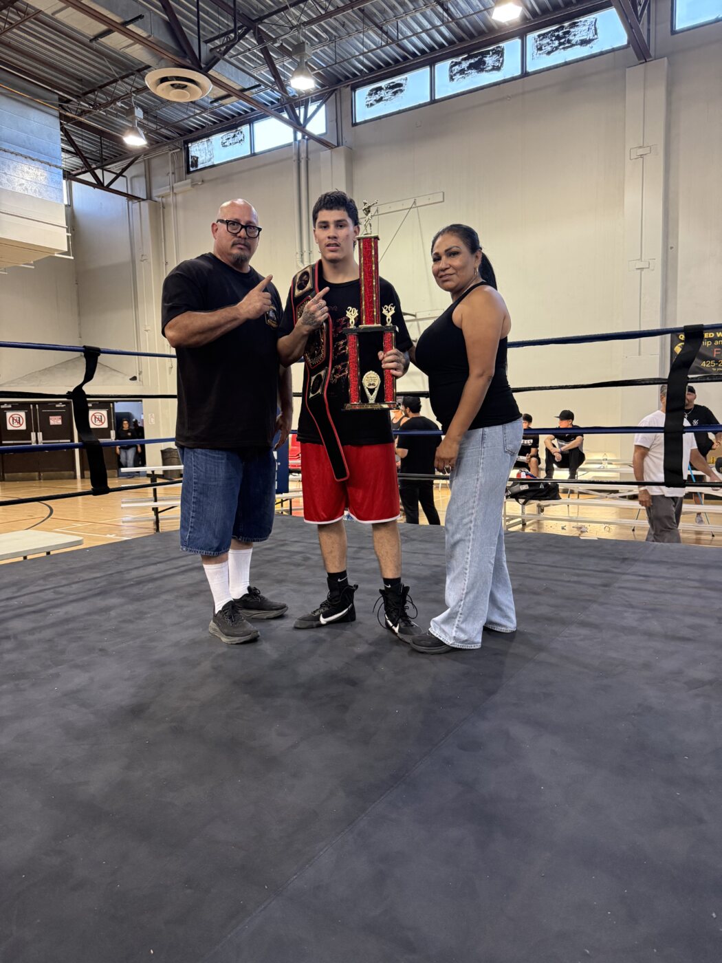 Anthony Williams with his championship belt and Fight of the Night trophy