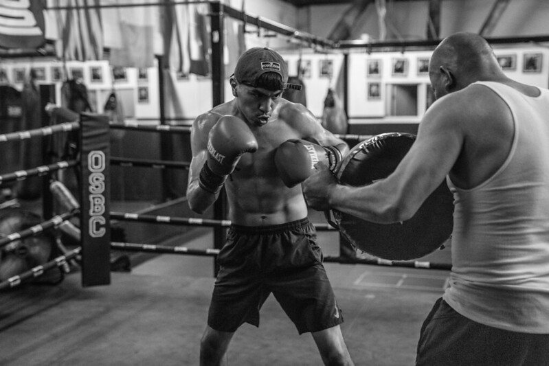 Old School Boxing Club member training on the mitts